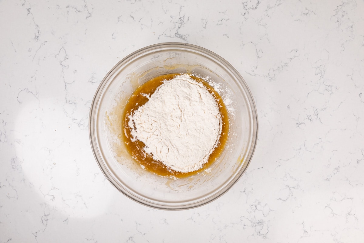 cookie dough in bowl with flour