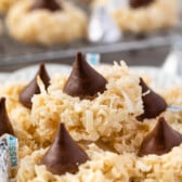 macaroon blossoms stacked on a white plate