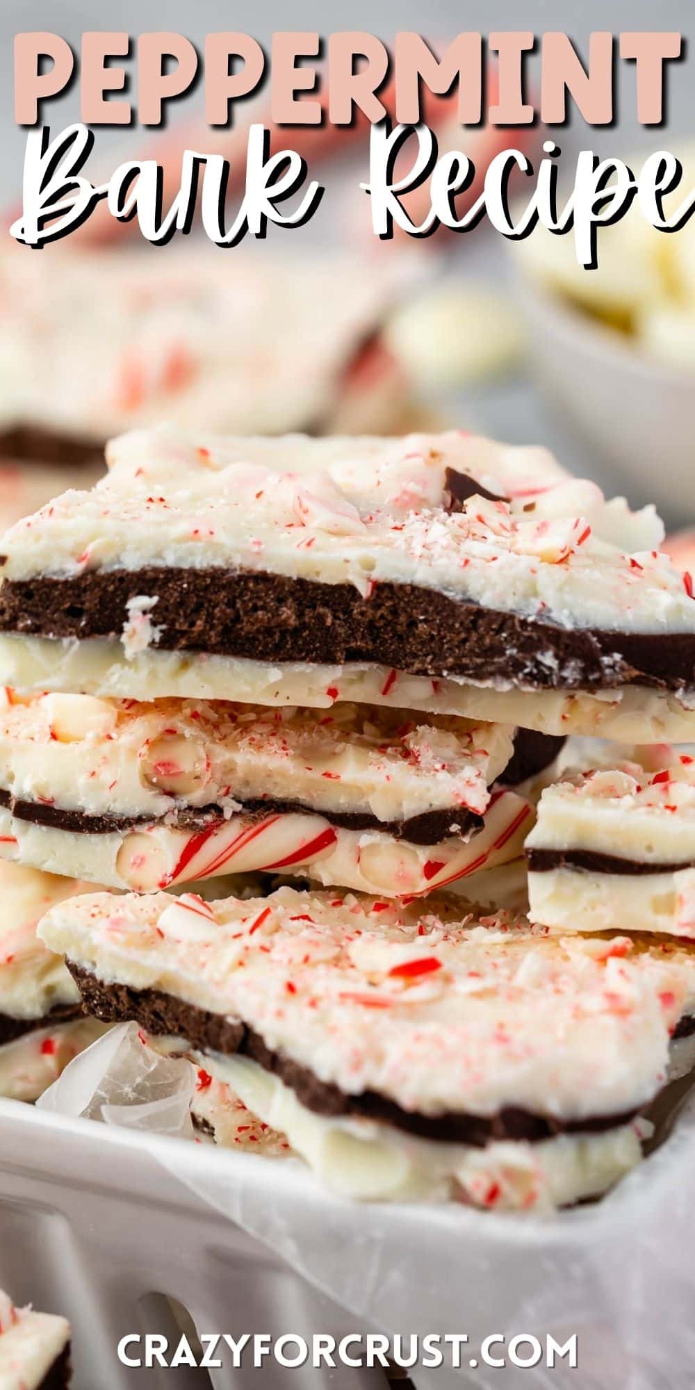 layered chocolate bark with crushed peppermint on top and words on top