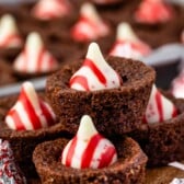 stacked brownie bites with a peppermint kiss in the middle