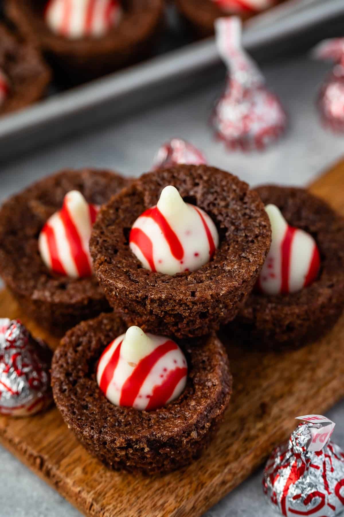 stacked brownie bites with a peppermint kiss in the middle