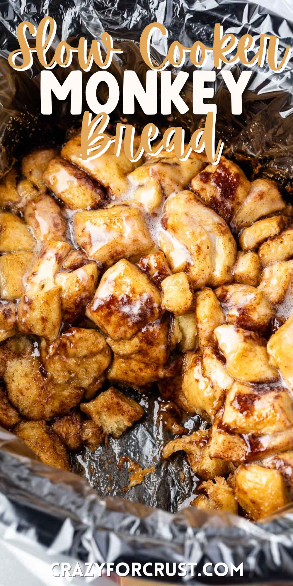 monkey bread covered in icing sitting in a slow cooker with words on top