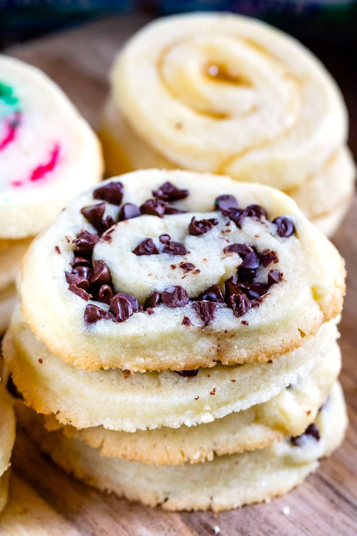 swirl cookies stacked with chocolate chips in the middle
