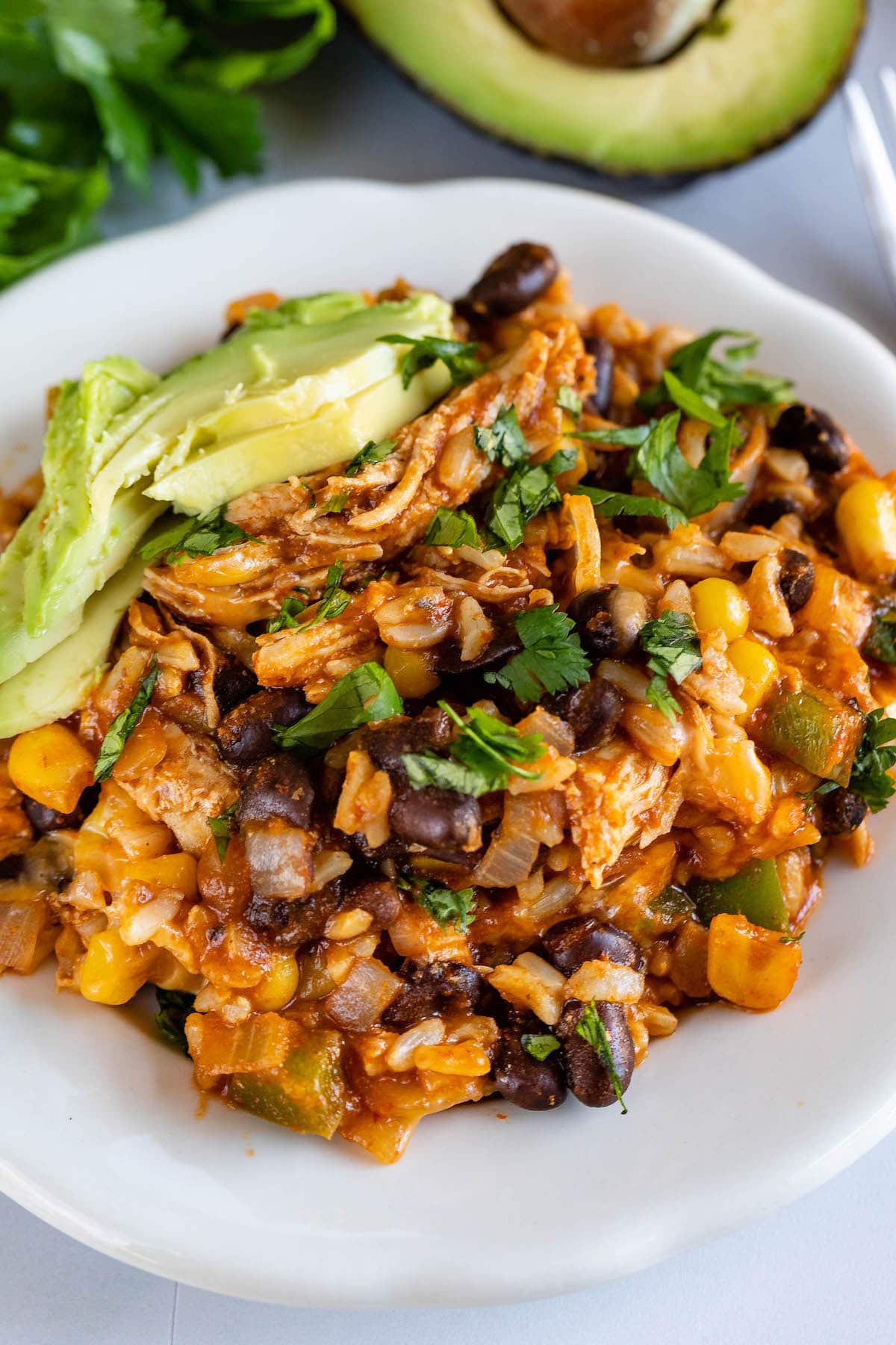 skillet mixed together with chicken, corn, beans and veggies