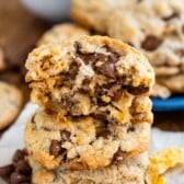 stacked frosted flake cookies with chocolate chips baked in