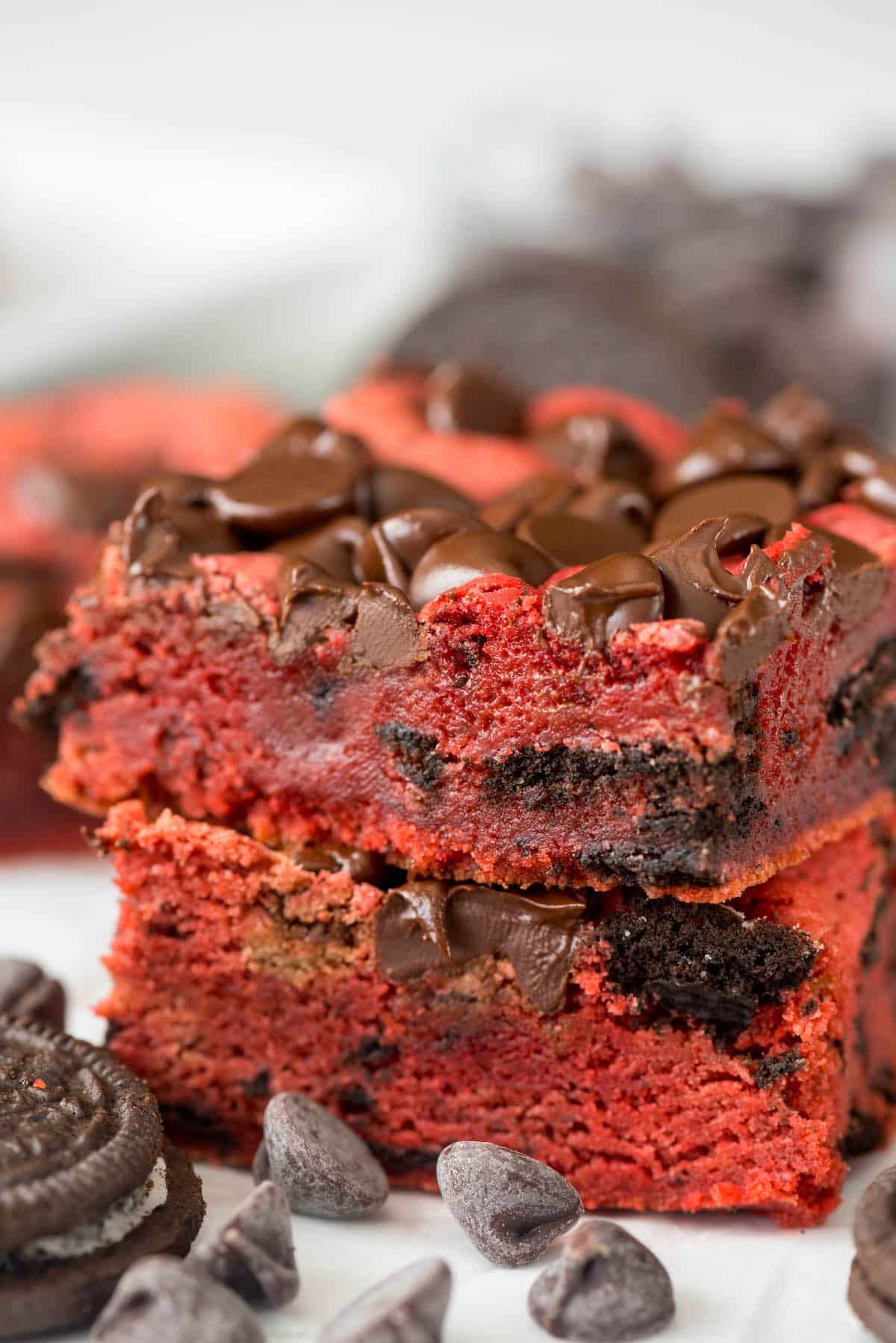 stacked red velvet bars with chocolate chips baked in