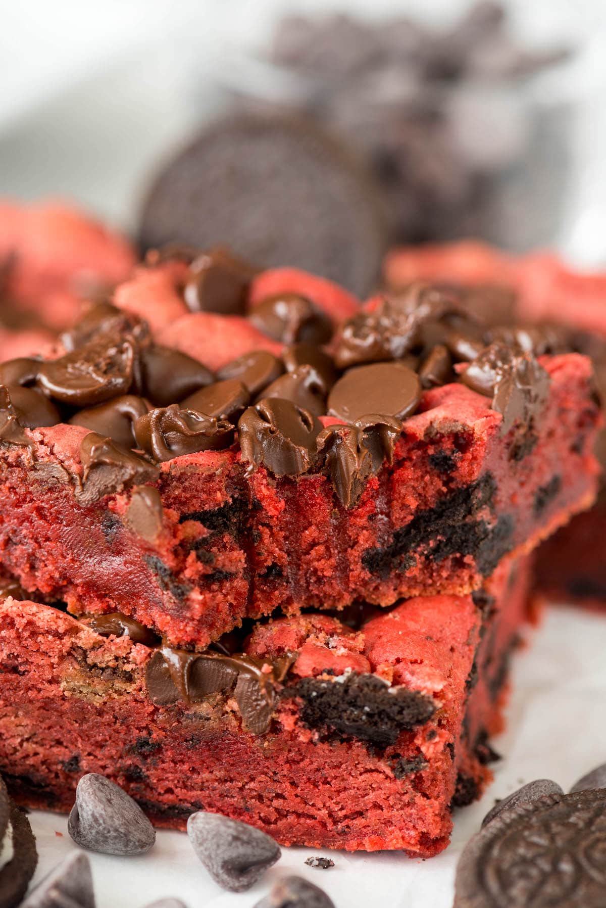 stacked red velvet bars with chocolate chips baked in