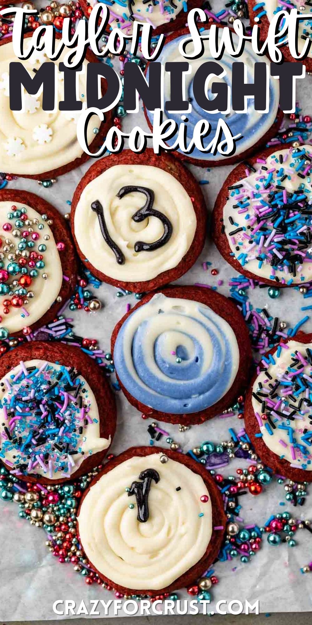 red velvet cookies with white frosting and blue and purple toppings with words on top