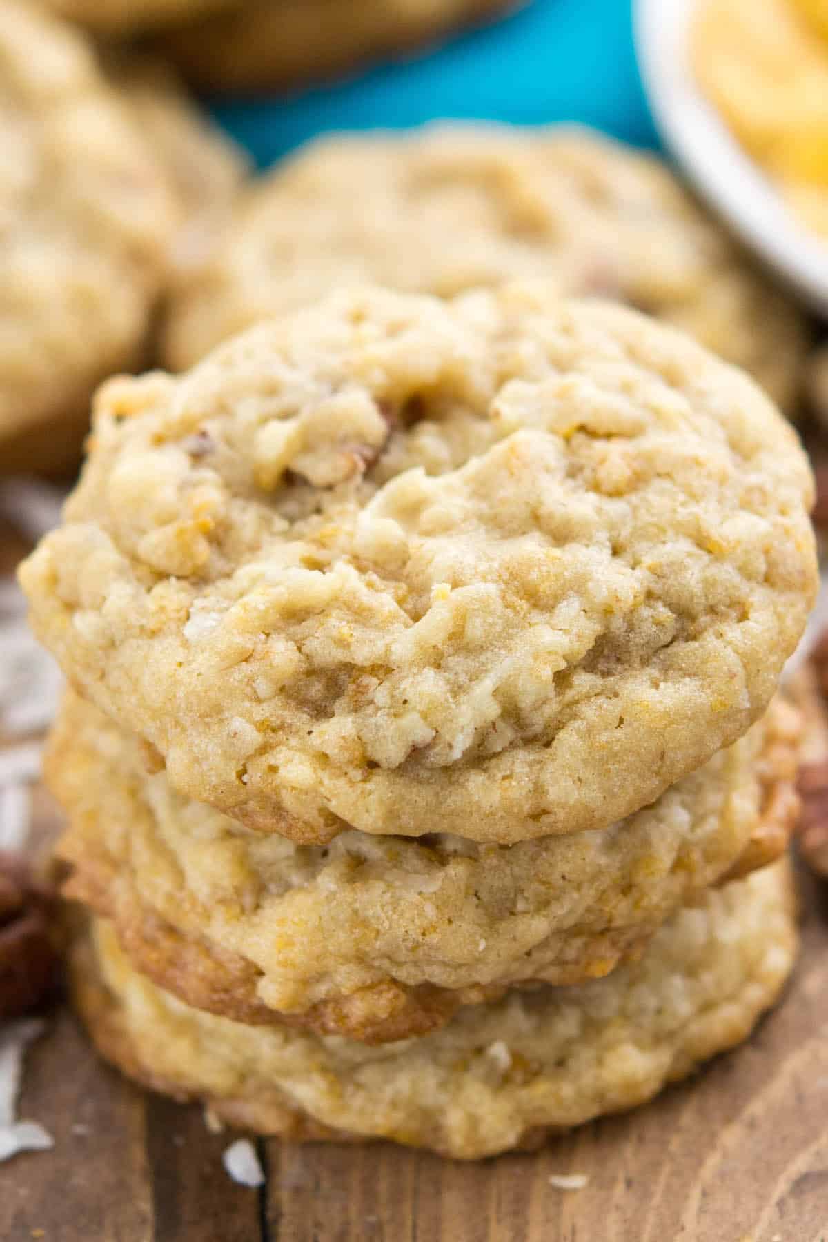 cookies stacked on a brown wood board