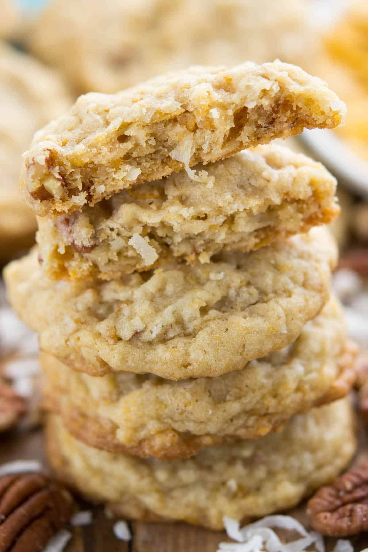 cookies stacked on a brown wood board