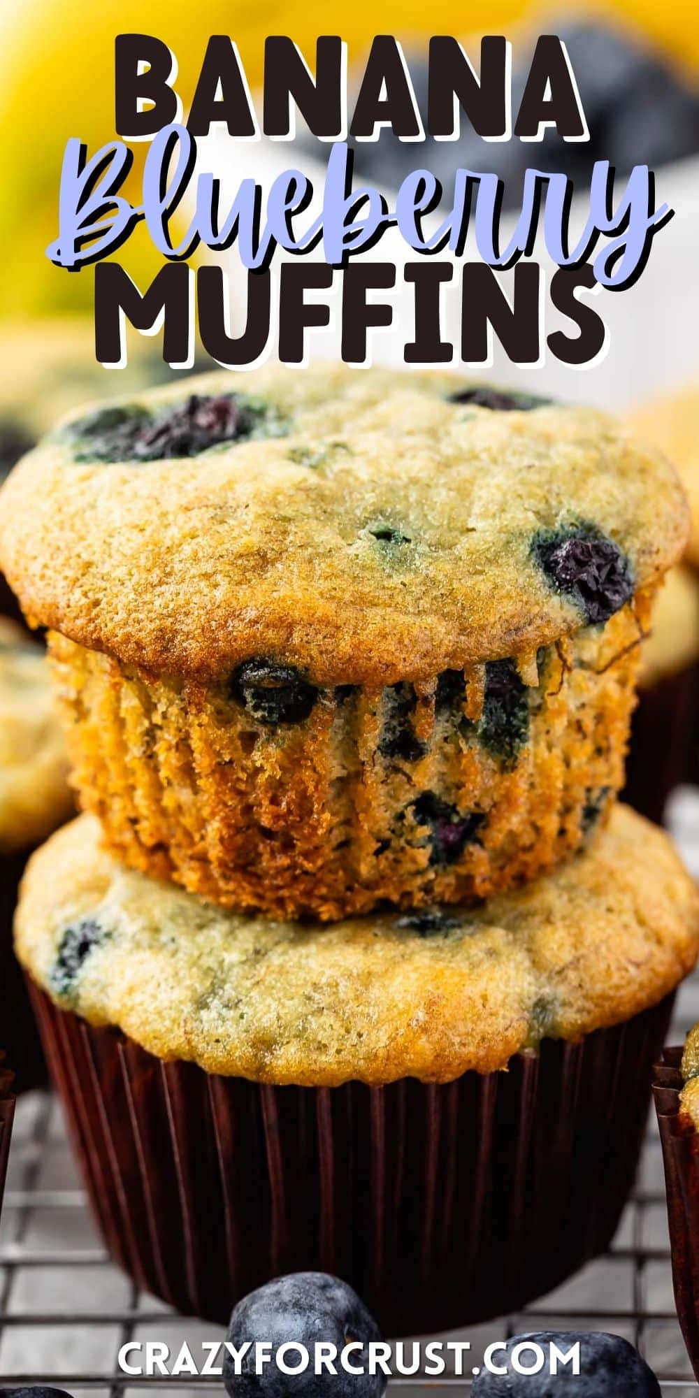 stacked blueberry muffins on a drying rack with words on top