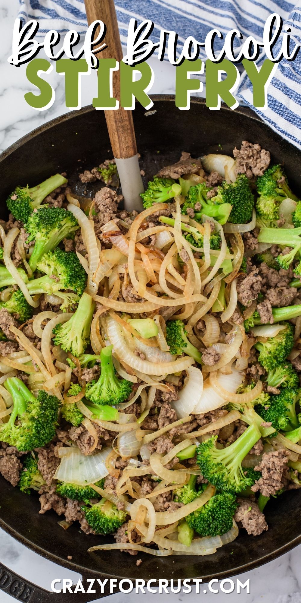 beef, broccoli and other things mixed together in a black pan with words on top
