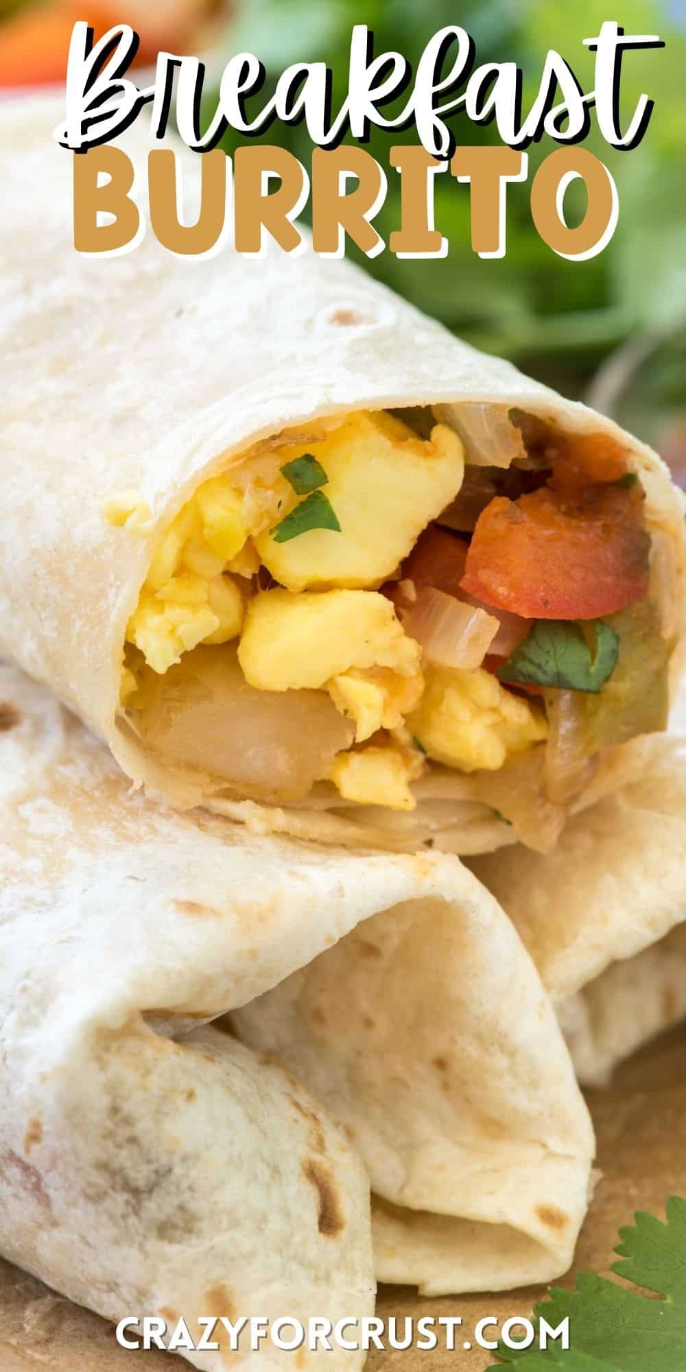 burrito stuffed with eggs and veggies with words on top of the image