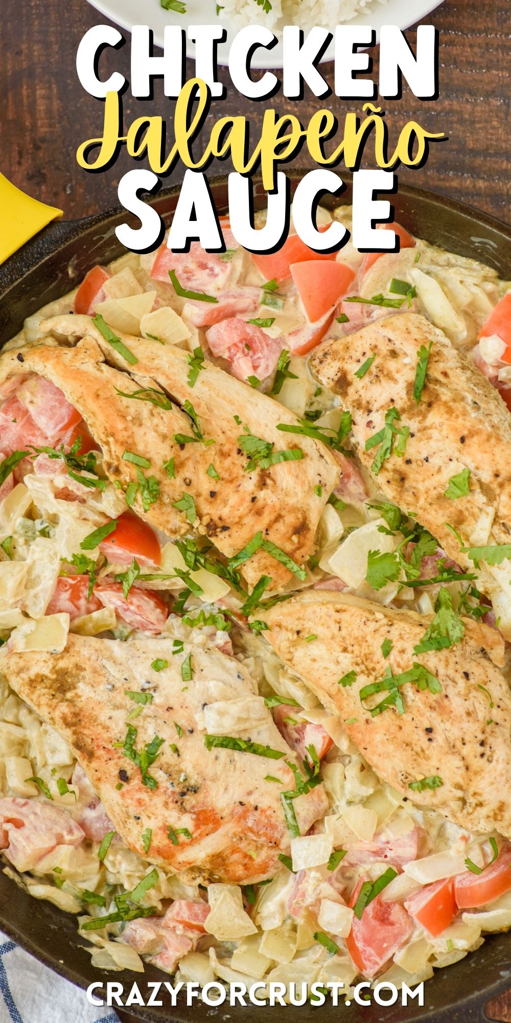 chicken and veggies in a pan with sauce and a spoon with words on top of the image