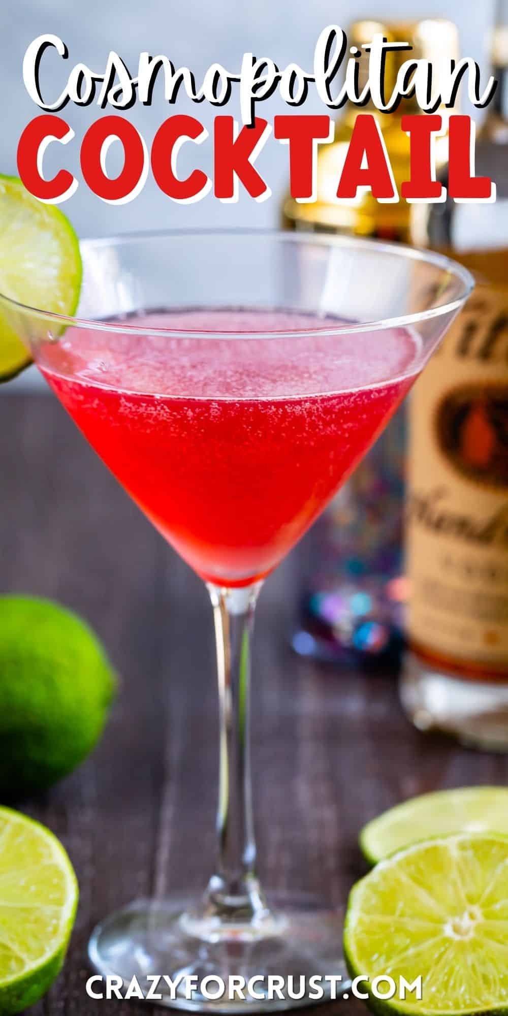 clear cocktail glass with a red drink and lime on the rim with words on top of the image