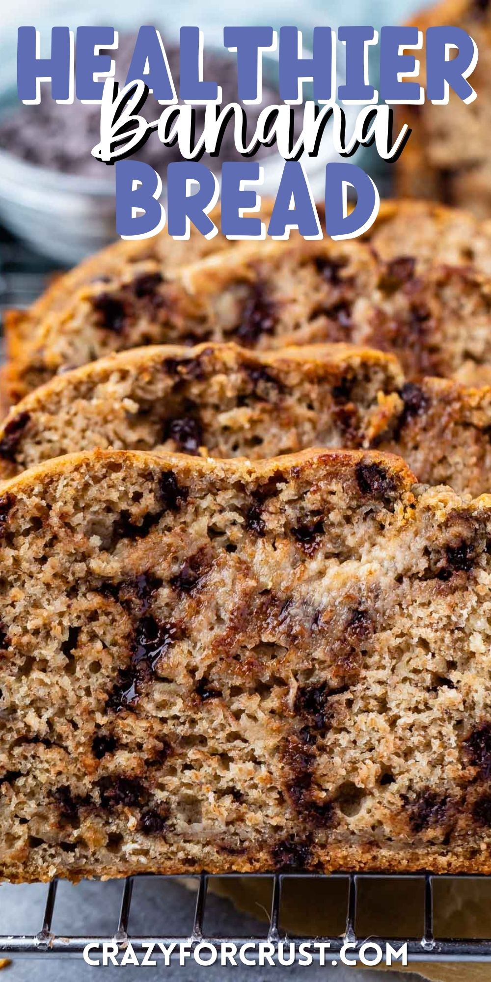 stacked banana bread on a drying rack with chocolate chips baked in with words on top