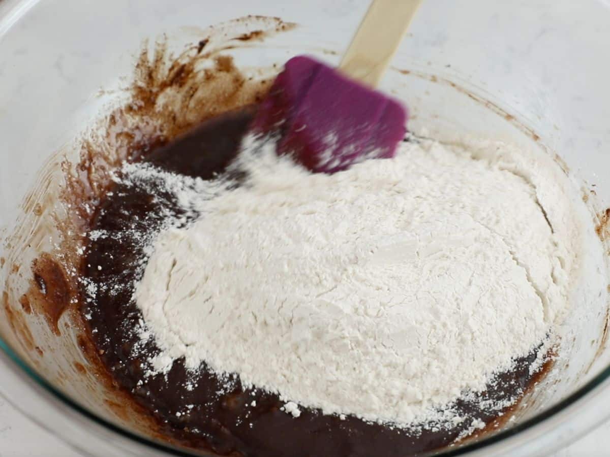 bowl of chocolate batter with flour.