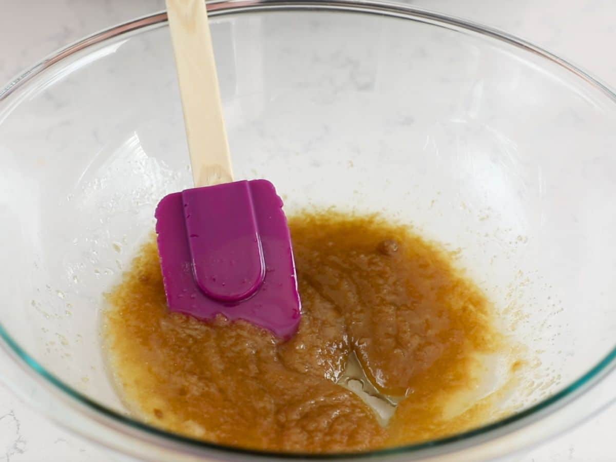 melted butter with sugars in bowl.