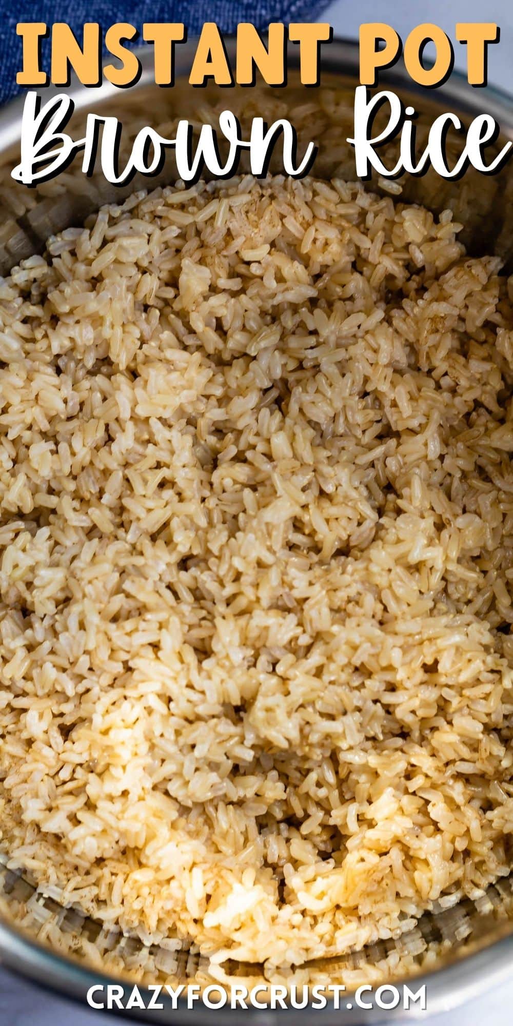 brown rice in a metal bowl with words on top