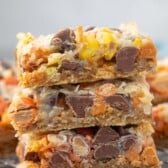 stacked bars with chocolate chips baked in on a drying rack