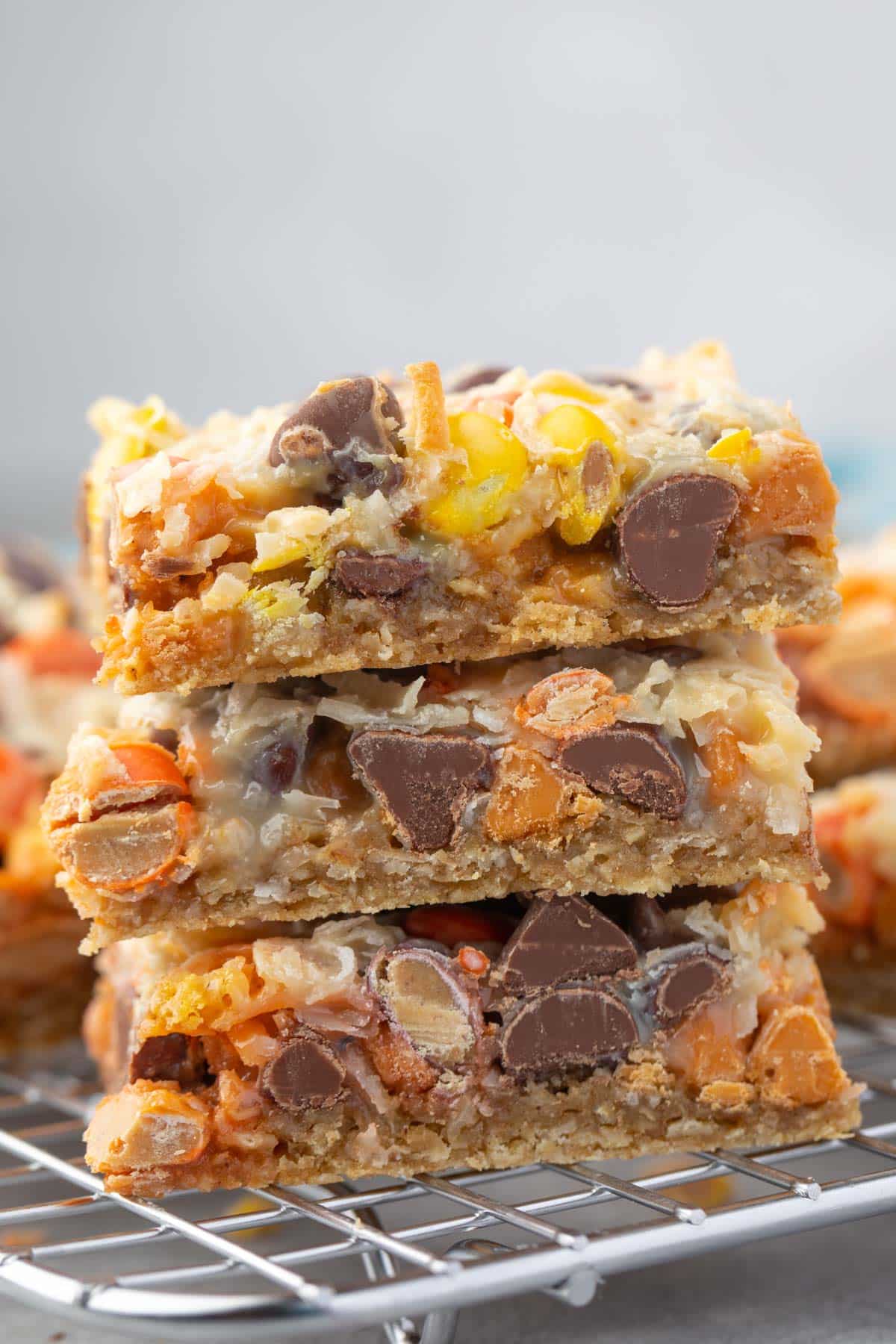 stacked bars with chocolate chips baked in on a drying rack