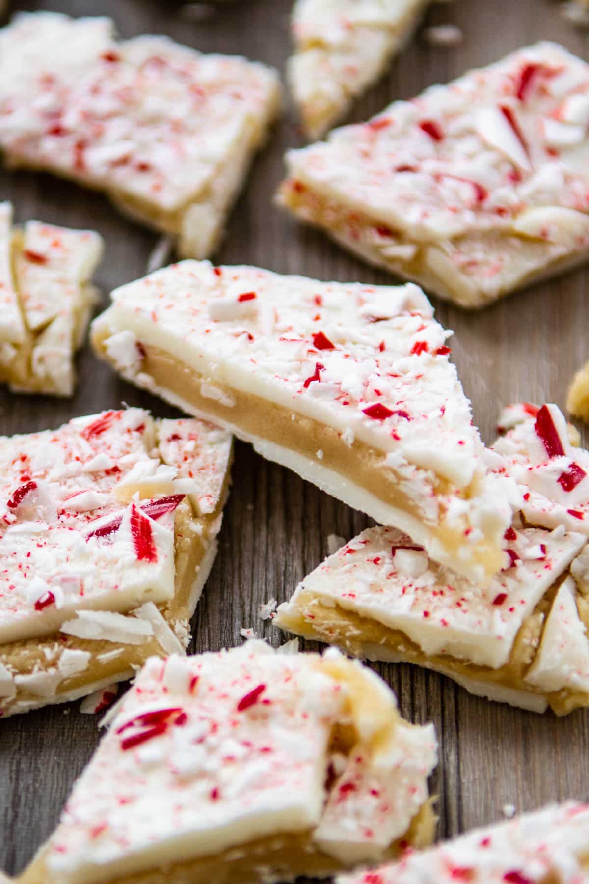 peppermint bark laid out on a brown wooden board