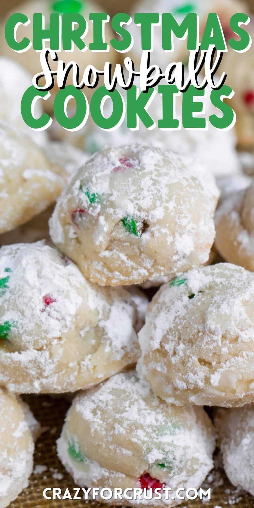 snowballs covered in powdered sugar with red and green m&ms baked in with words on top of the image