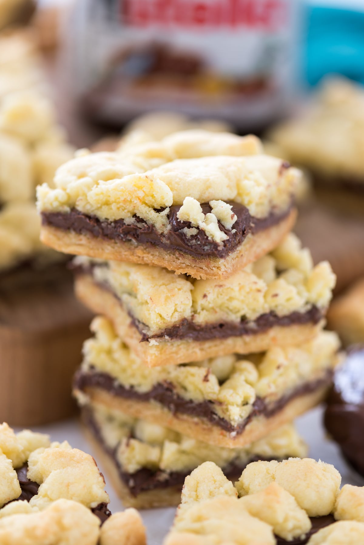 stacked crumble bars with nutella in the middle