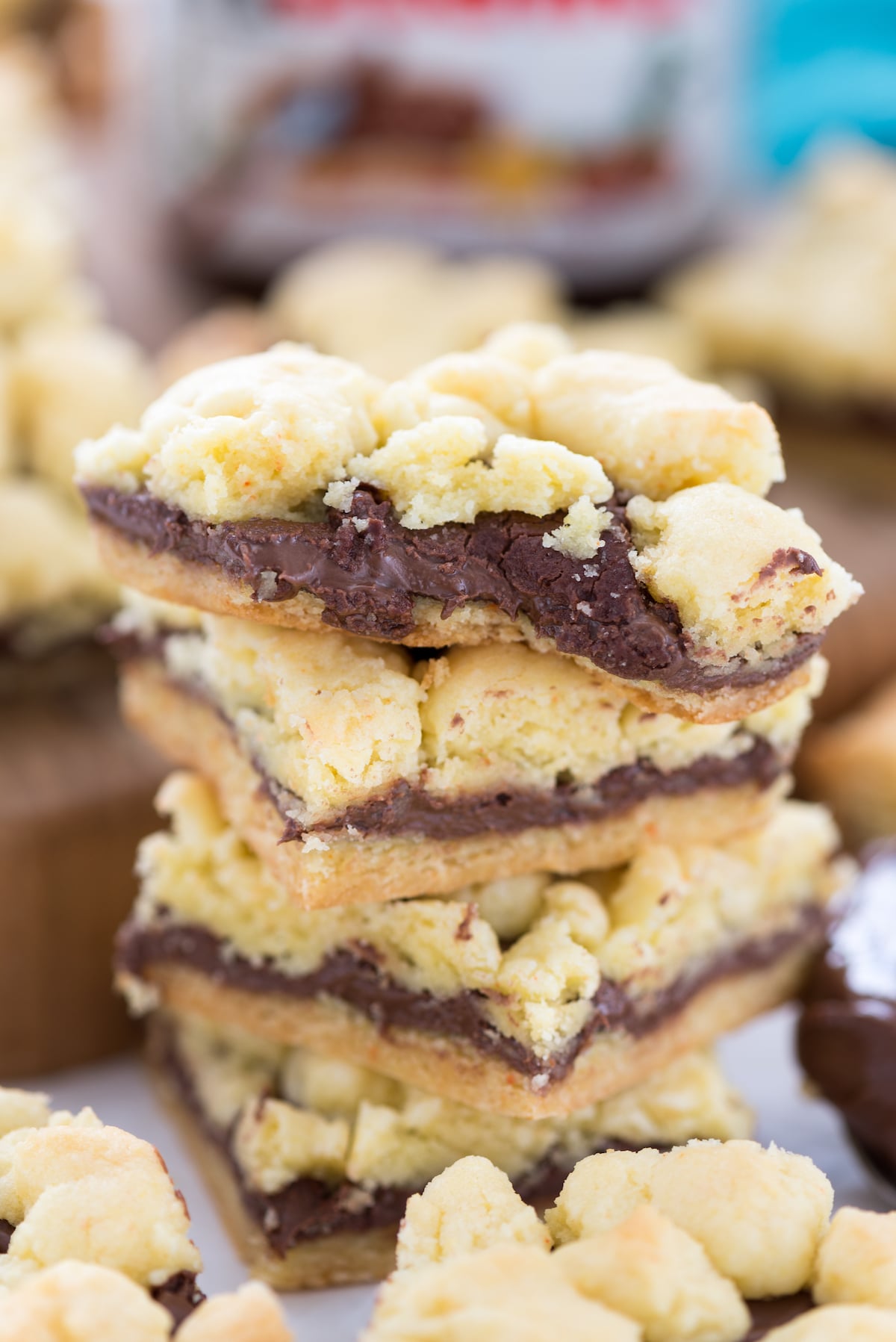 stacked crumble bars with nutella in the middle