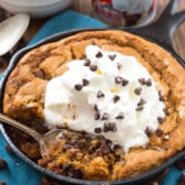 cookie pie in a small pan with ice cream on top