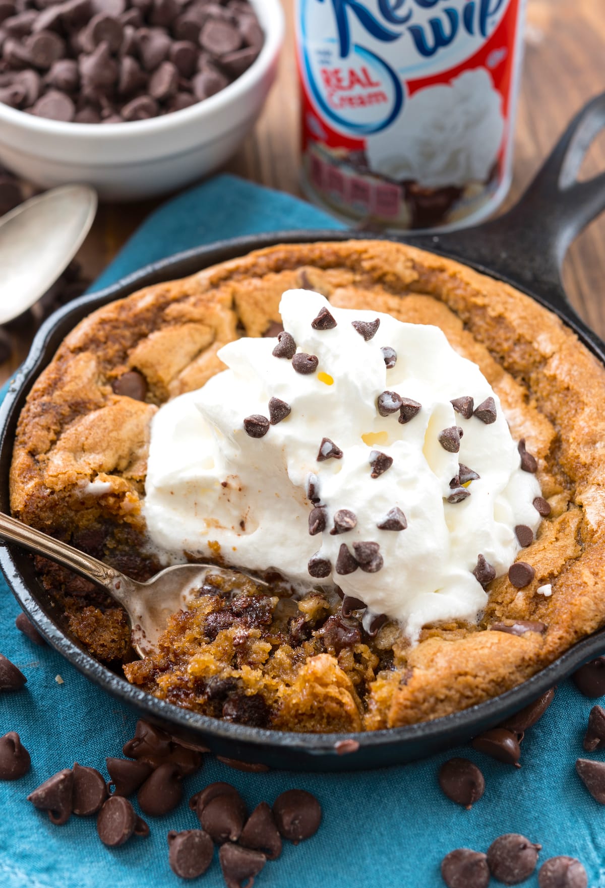 cookie pie in a small pan with ice cream on top