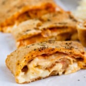 sliced turkey Stromboli on parchment paper