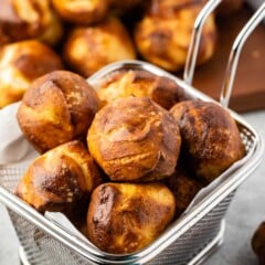 pretzel bites in a metal sifter