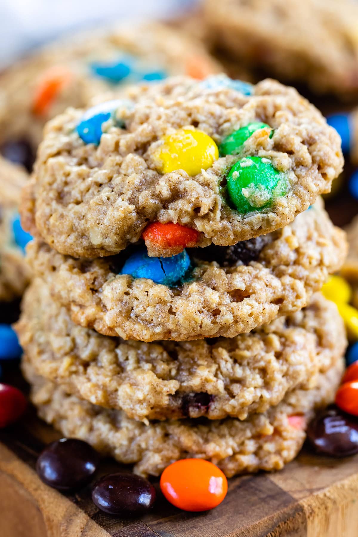 stacked oatmeal cookies with candy mixed in