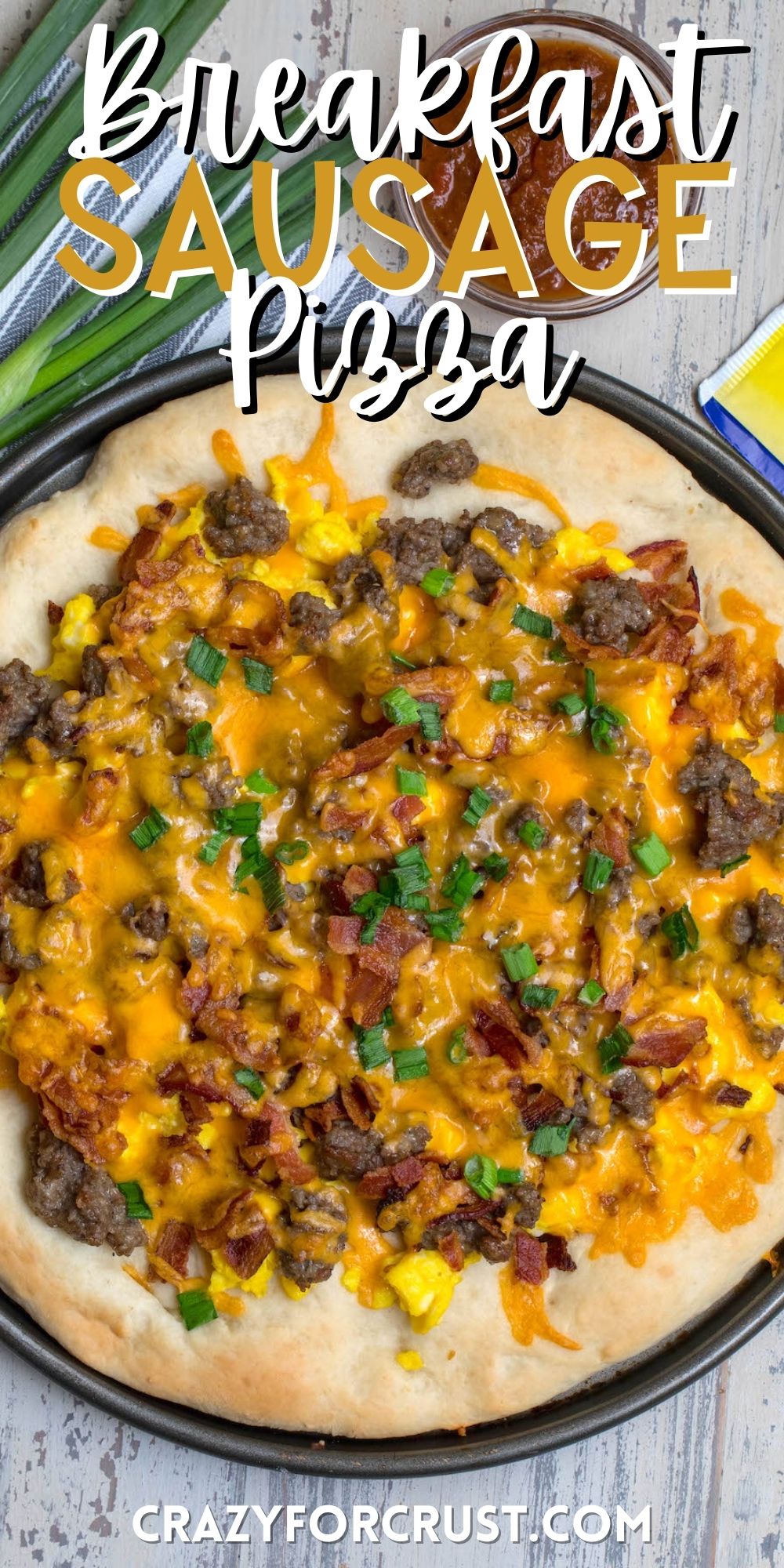 pizza with cheese and sausage on top with words on the image