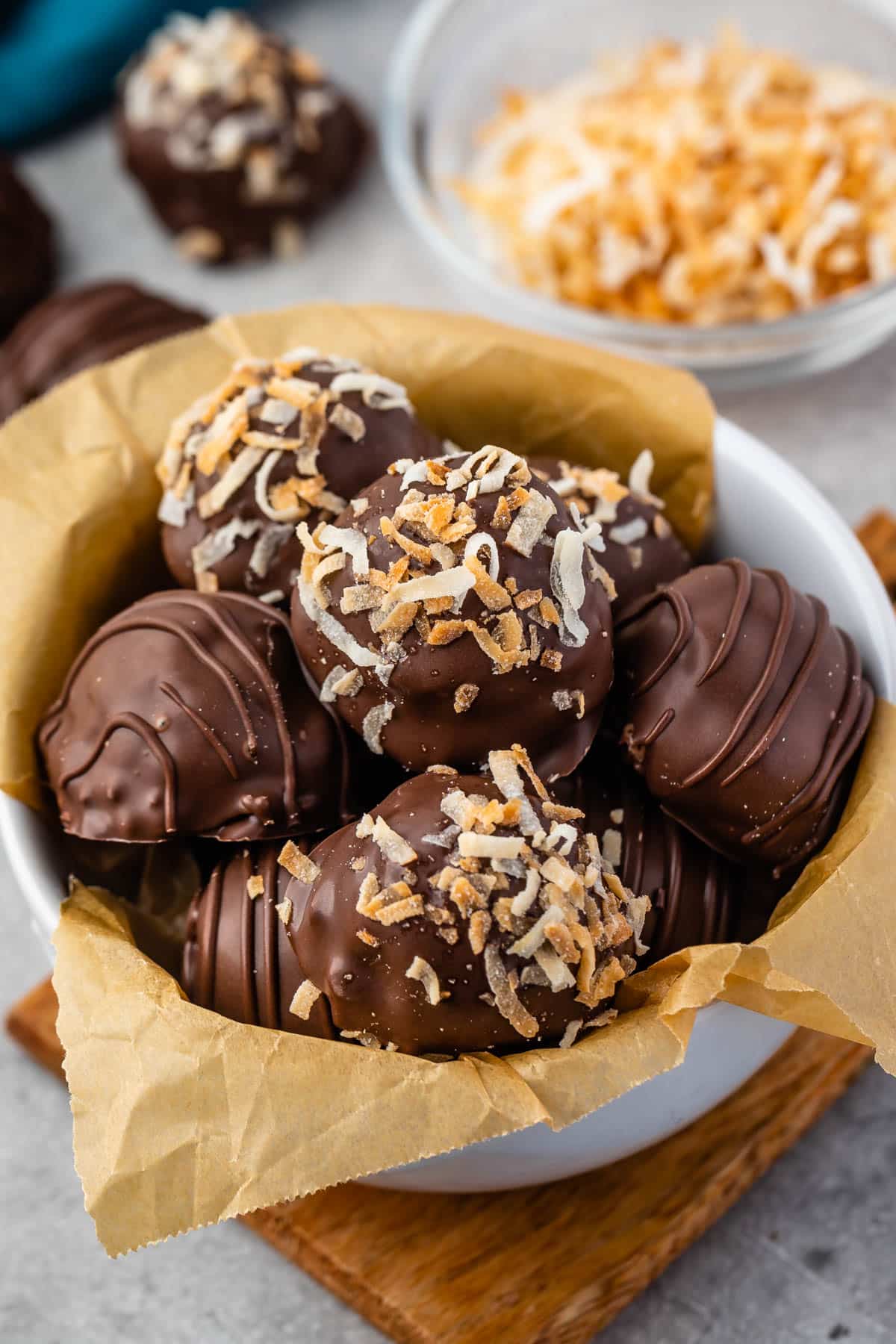 truffles covered in chocolate in a white bowl