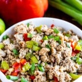 turkey and peppers mixed in a white bowl
