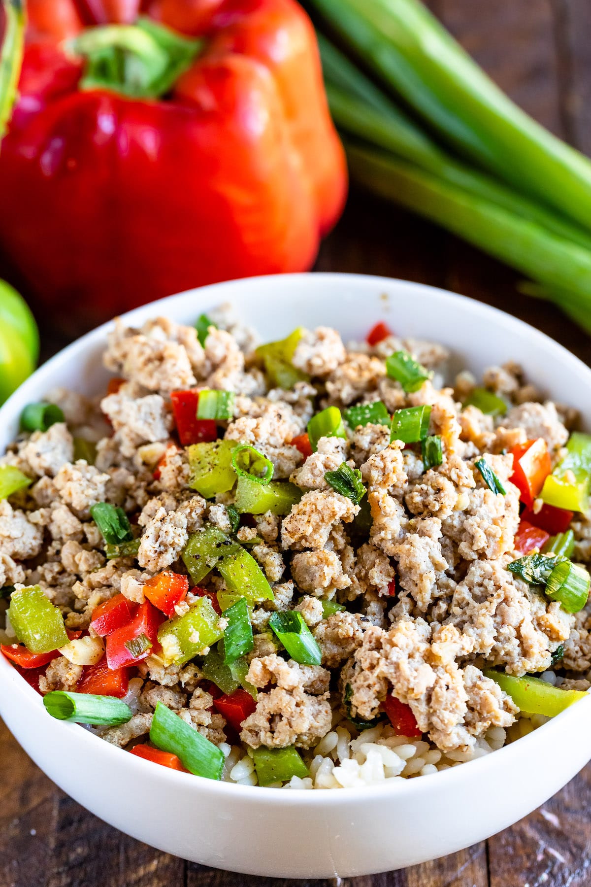 turkey and peppers mixed in a white bowl