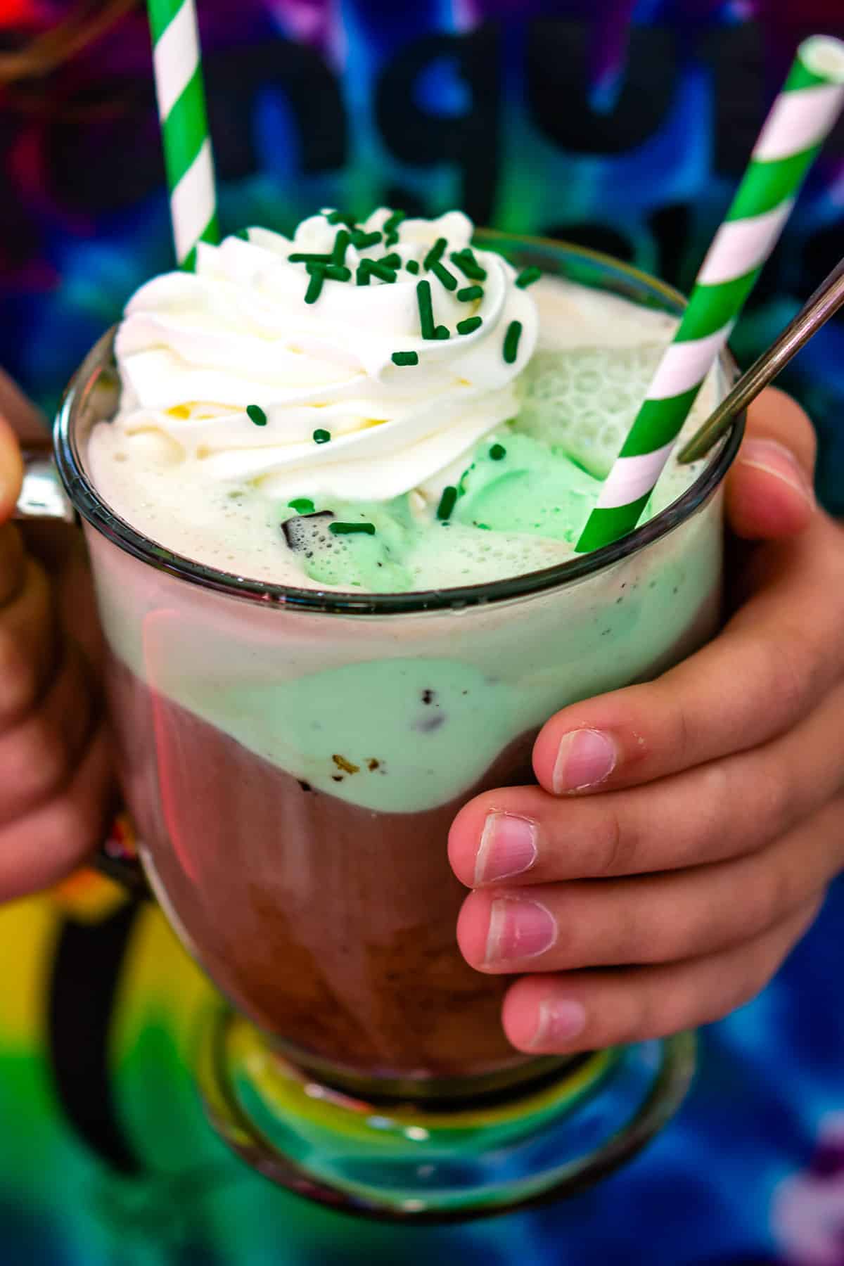 hot chocolate and mint ice cream on a clear jar.