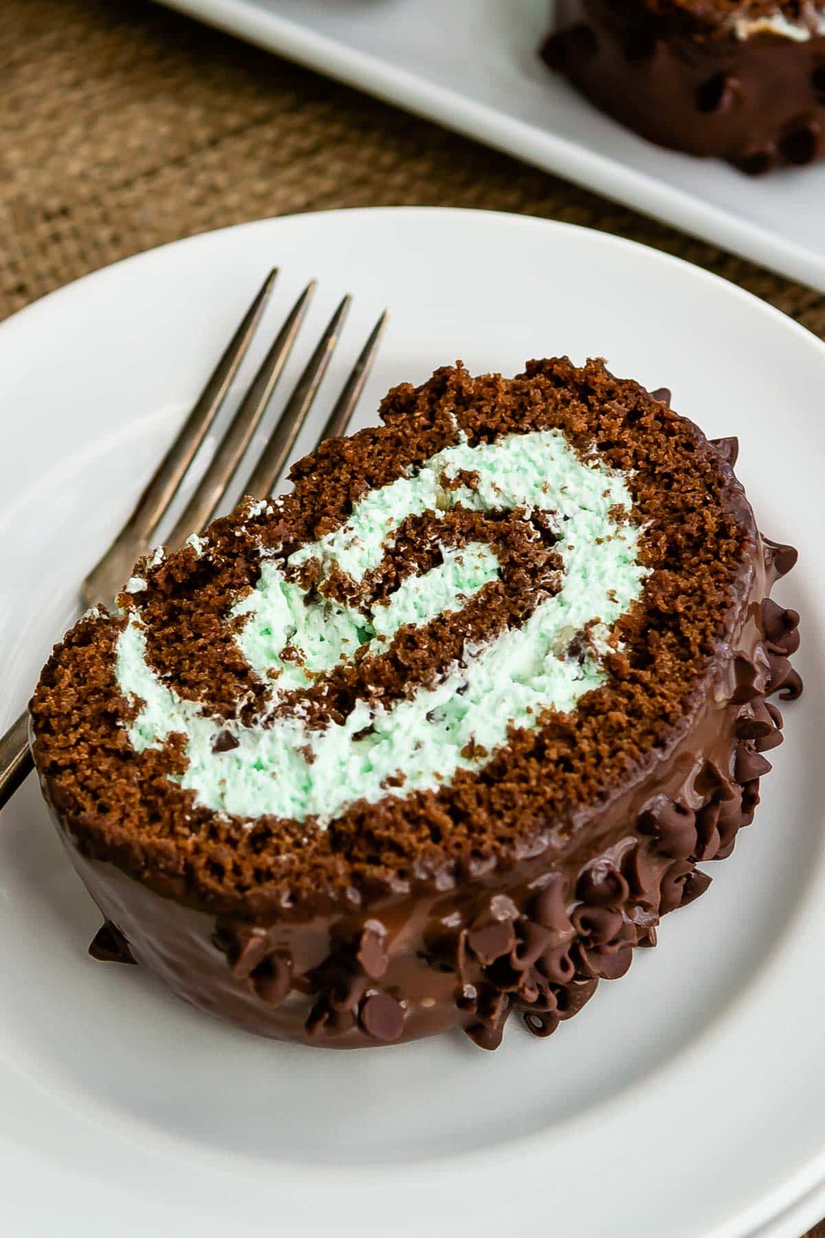 cake roll covered in chocolate filled with mint filling.