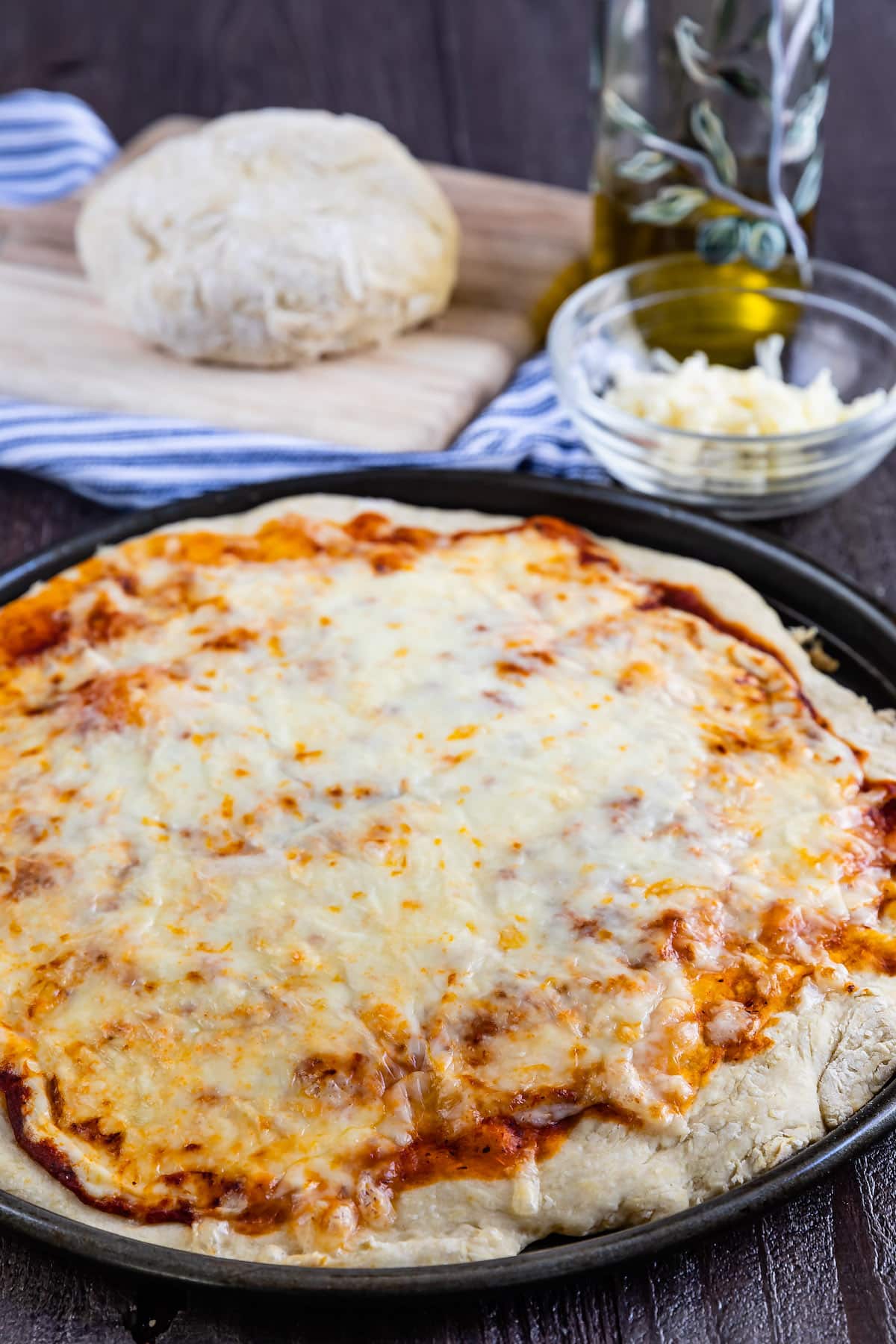 pizza in a black pizza pan