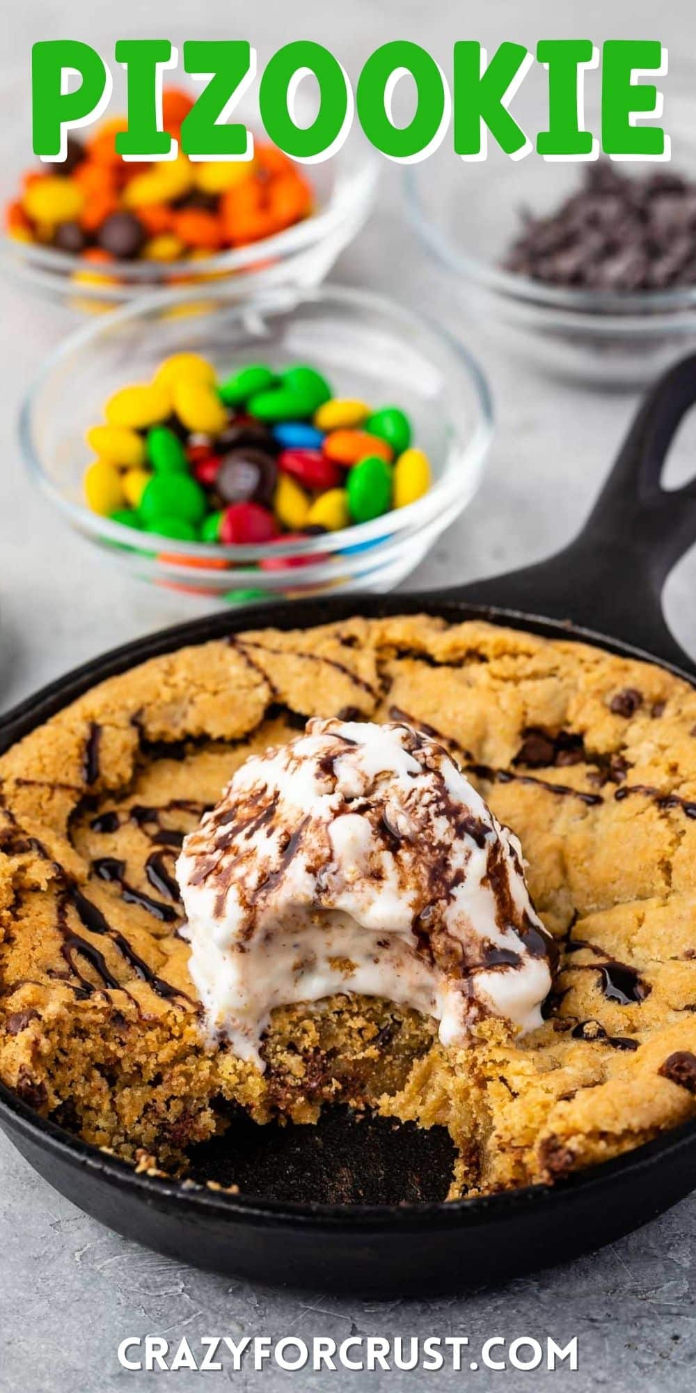 cookie pie in a small pan with ice cream on top with words on top