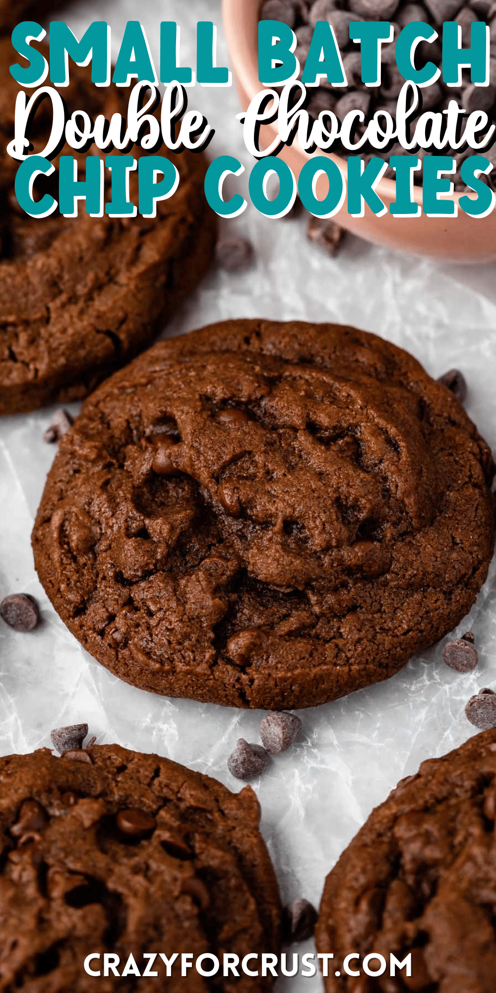 chocolate cookies with chocolate chips baked in on parchment paper with words on the image