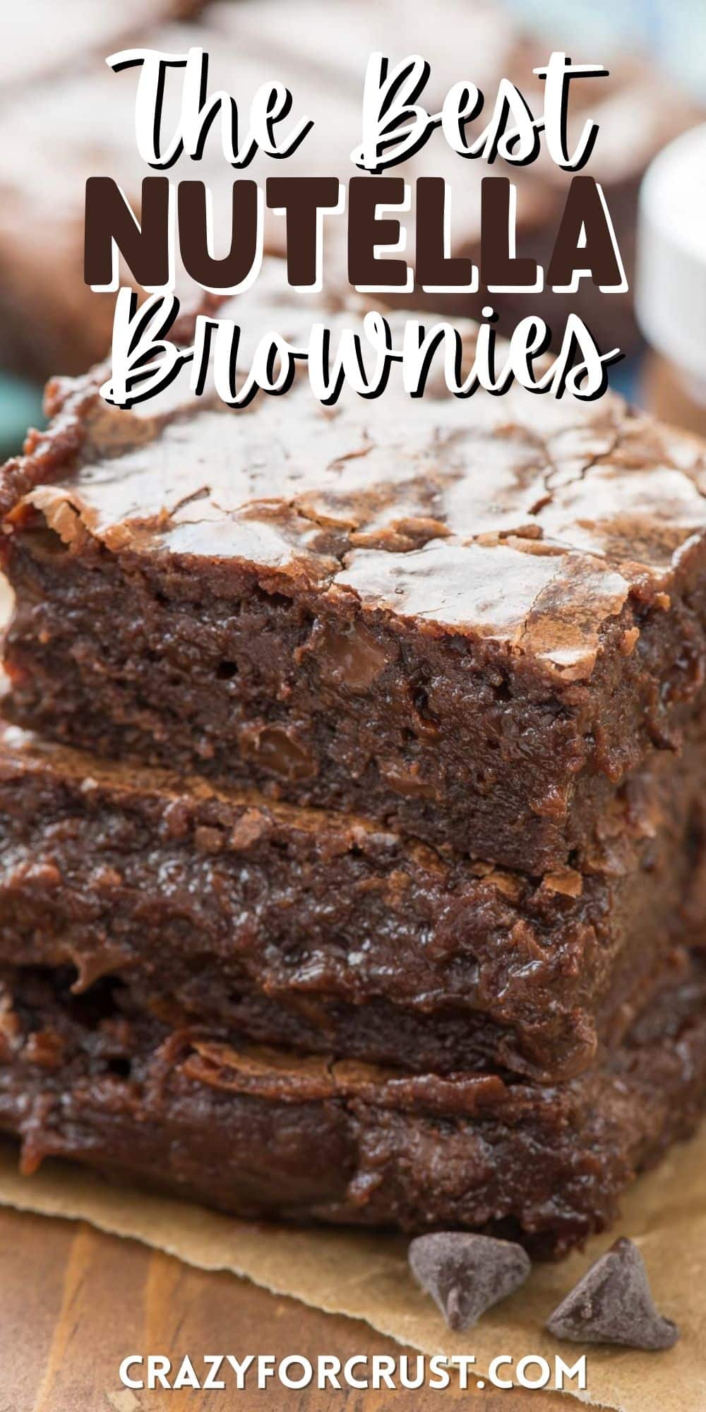 stacked brownies and a wood table with words on the image