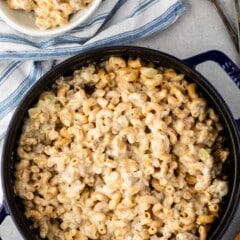 Mac and cheese in a black pan.