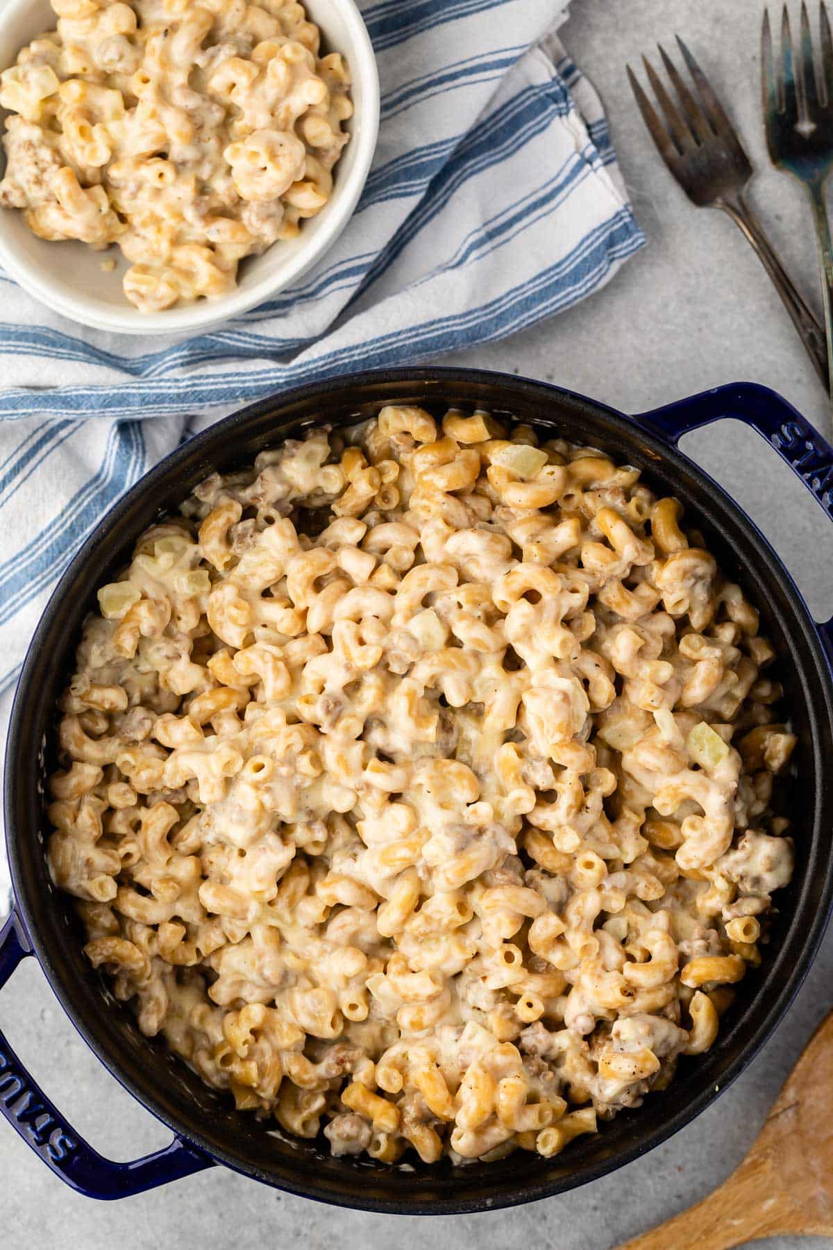 Mac and cheese in a black pan.