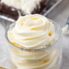 coconut swirled in a clear jar mixed with coconut.