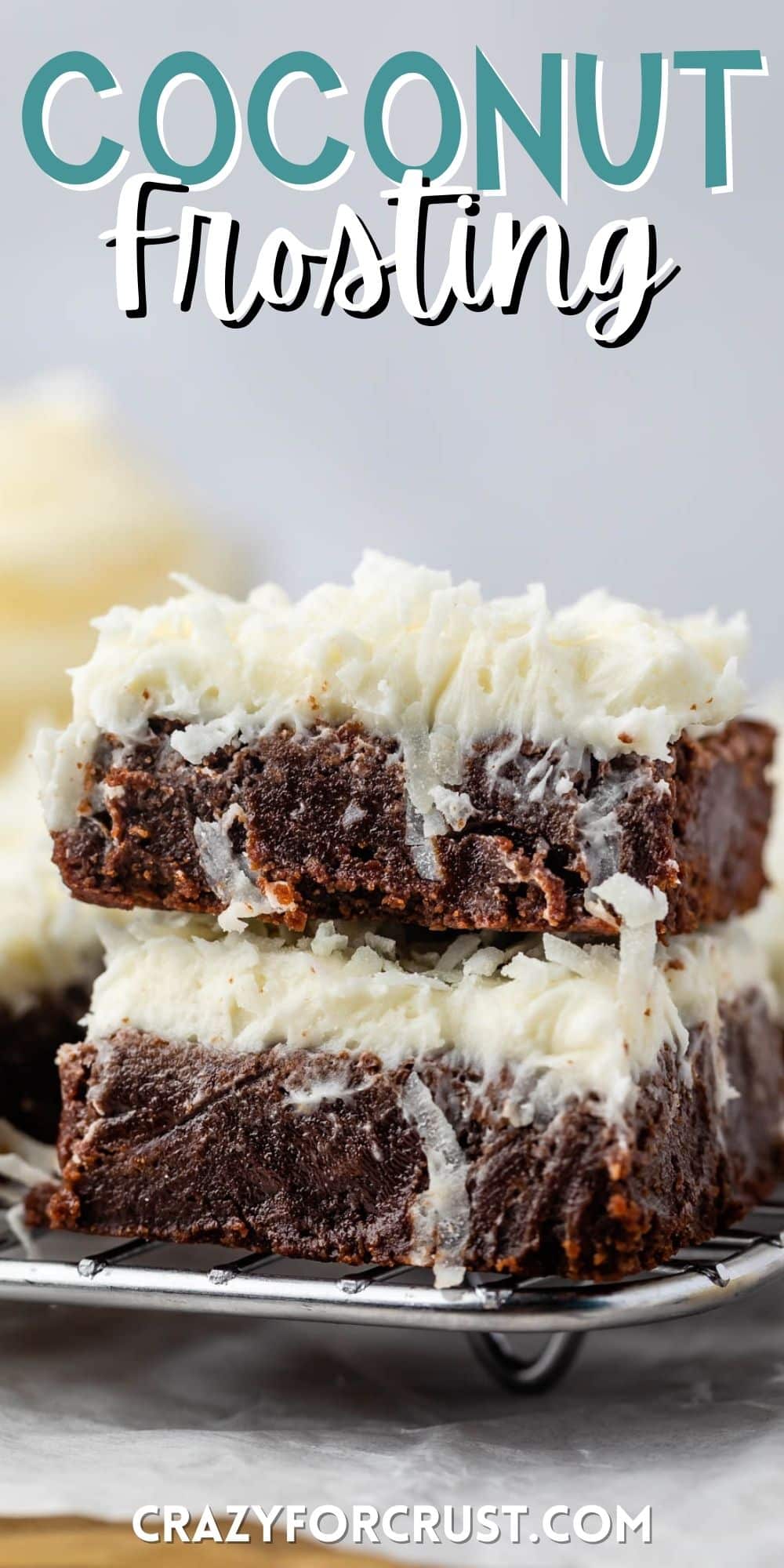 stacked brownies with white frosting mixed with coconuts with words on the image.