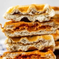 stacked waffles stuffed with peanut butter and jelly and pizza ingredients.