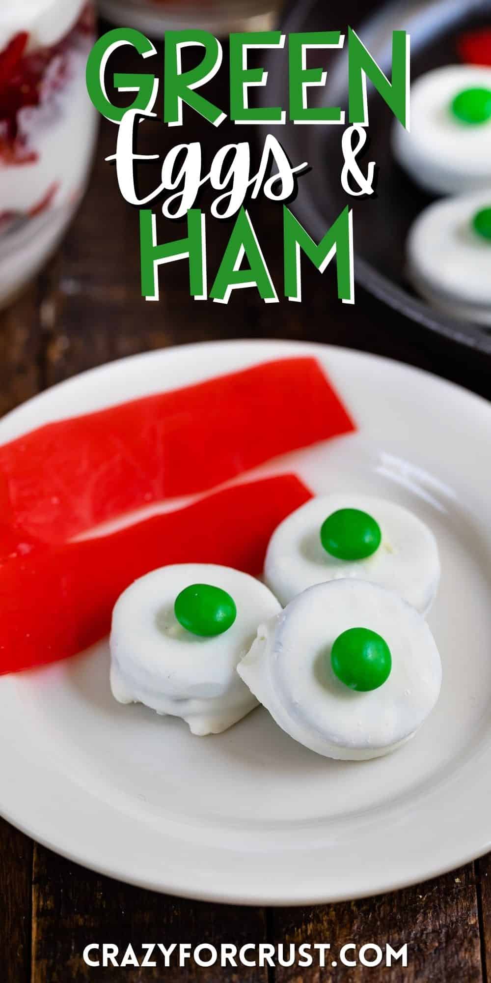 green eggs and ham made from various candies on a white plate with words on the image.